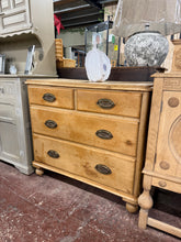 Load image into Gallery viewer, A charming antique pine chest offering authentic character and reliable storage. This piece is structurally sound with four dovetail-jointed drawers—two smaller upper drawers and two deep lower drawers—perfect for organizing bedroom or living space. Age-appropriate wear and marks add to its vintage appeal and genuine provenance. An ideal choice for those seeking quality vintage furniture with timeless design.

Delivery Available

Overall Dimensions

98cm wide x 49.5cm deep x 87cm high

