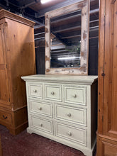 Load image into Gallery viewer, This charming wooden chest of drawers combines vintage character with practical storage. Featuring solid construction with dovetail-jointed drawers—three short drawers perfect for accessories, topped with four generous long drawers for linens and clothing. The piece shows gentle signs of age and use, adding to its authentic shabby chic appeal. Ideal for bedrooms, hallways, or living spaces seeking warmth and vintage style.

Delivery Available

Overall Dimensions

122cm wide x 46cm deep x 102cm high

