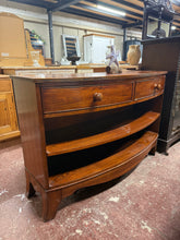 Load image into Gallery viewer, This Willis &amp; Gambier bookcase combines classic design with practical storage. Structurally sound and ready to use, it features two short drawers and one open shelf—ideal for displaying books and decorative pieces. As a pre-owned piece, it shows gentle signs of use consistent with its age and character. A timeless addition to any home library or living space.

Delivery Available

Overall Dimensions

120cm wide x 42cm deep x 79.5cm high

