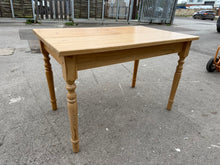 Load image into Gallery viewer, This sturdy pine dining table is in excellent overall condition and is structurally sound. It has minor wear and tear from use but is still well-maintained. The legs are fixed and cannot be removed.

Overall Dimensions

115cm long x 70cm wide x 75cm high

DELIVERY AVAILABLE      

For our other items see our website https://fossewayfurniture.co.uk

collection from our shop at cv36, our collection zone at bs36 or otherwise delivery is available


