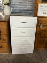 Load image into Gallery viewer, Discover the potential in this sturdy white tallboy, built to last with solid construction and reliable functionality. Its four generous drawers provide ample storage space for bedrooms, hallways, or living areas. Though it bears the honest signs of previous use, this piece remains in good working order and presents an exciting opportunity for restoration enthusiasts.

Delivery Available

Overall Dimensions

54.5cm wide x 46.5cm deep x 90cm high&nbsp; &nbsp; &nbsp;

