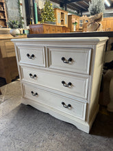 Load image into Gallery viewer, A charming white chest of drawers that combines practicality with timeless appeal. Featuring a classic configuration of two compact drawers above two spacious ones, it's ideal for nurseries or bedrooms seeking smart storage solutions. This pre-loved piece retains its structural integrity and solid functionality, with a few marks that speak to its history.&nbsp;

Delivery Available

Overall Dimensions

82cm wide x 34cm deep x 72.5cm high&nbsp; &nbsp; &nbsp;&nbsp;

