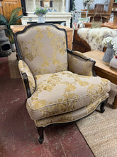 Load image into Gallery viewer, A charming Louis-style armchair with authentic period appeal. This pre-loved piece boasts solid construction and remains in great condition, bearing the gentle patina of age with only minor surface marks. Its graceful silhouette and refined detailing make it an understated focal point for period interiors or eclectic spaces seeking character and elegance.

Delivery Available

Overall Dimensions

approx : 90cm wide x 76cm deep x 91cm high&nbsp;

