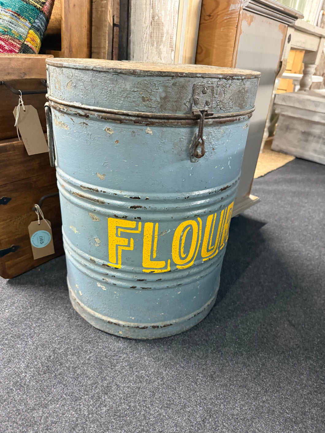 Transform your space with this charming vintage Flour tin, reimagined as a functional side table or compact stool. The hinged top opens to unveil hidden storage—perfect for keeping blankets, magazines, or decorative items within easy reach. A delightful conversation starter that brings character and practicality to any room.

Delivery Available

Overall Dimensions

38.5cm diameter x 53cm high     
