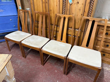 Load image into Gallery viewer, This cheerful set includes 4 dining chairs that are sturdy and in good overall shape. While they show some signs of use, the marks are minor and do not affect their solid construction.

Overall Dimensions

approx : 49cm wide x 42cm deep x 97cm high

DELIVERY AVAILABLE      

For our other items see our website https://fossewayfurniture.co.uk

collection from our shop at cv36, our collection zone at bs36 or otherwise delivery is available

