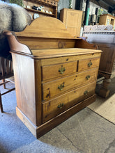 Load image into Gallery viewer, This charming vintage pine chest of drawers combines authentic character with practical storage. Featuring a gallery back and solid construction, it showcases two short dovetail-jointed drawers above two generous long drawers—ideal for bedroom or living room organisation. The piece bears the gentle patina of age, with marks that enhance its vintage appeal. Structurally sound and in good condition, it's a timeless addition to any home with period charm.

Delivery Available

Overall Dimensions

112cm wide x 4
