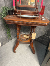 Load image into Gallery viewer, A charming mahogany side table with practical appeal. This piece combines solid construction with a useful lower shelf, offering both display space and storage functionality. Its compact size makes it ideal for hallways, living rooms, or beside seating. The warm tones of mahogany bring timeless character to any interior scheme. A versatile addition that balances style with everyday utility.

Delivery Available

Overall Dimensions

61cm wide x 45cm deep x 71cm high
