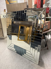 Load image into Gallery viewer, The Llewelyn Bowen mirror combines timeless design with excellent condition. Crafted to last, this piece shows minimal wear with only the occasional light mark that doesn't detract from its overall appeal.

Delivery Available

Overall Dimensions

80cm x 80cm
