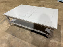 Load image into Gallery viewer, A spacious pine coffee table with vintage character, finished in soft grey tones. Features a practical lower shelf ideal for storing books, magazines, or decorative items. The piece shows signs of use with minor surface marks , along with some cosmetic wear including an edge repair and absent trim sections. Despite its well-loved appearance, the table remains fully functional and sturdy.&nbsp;

Delivery Available

Overall Dimensions

140cm wide x 90cm deep x 46cm high
