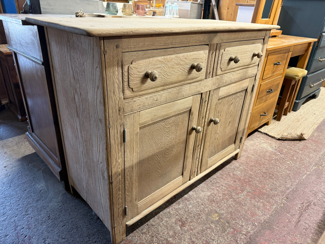 This beautiful Ercol sideboard has been fully restored to its original, natural finish and could be enhanced with a layer of wax for added protection. It’s in good condition overall, showing just a few minor marks. Offering plenty of storage, it features two dovetail-jointed drawers above a double cupboard with one shelf inside.

Overall Dimensions

122cm wide x 51cm deep x 91cm high

DELIVERY AVAILABLE      

For our other items see our website https://fossewayfurniture.co.uk

collection from our shop at c
