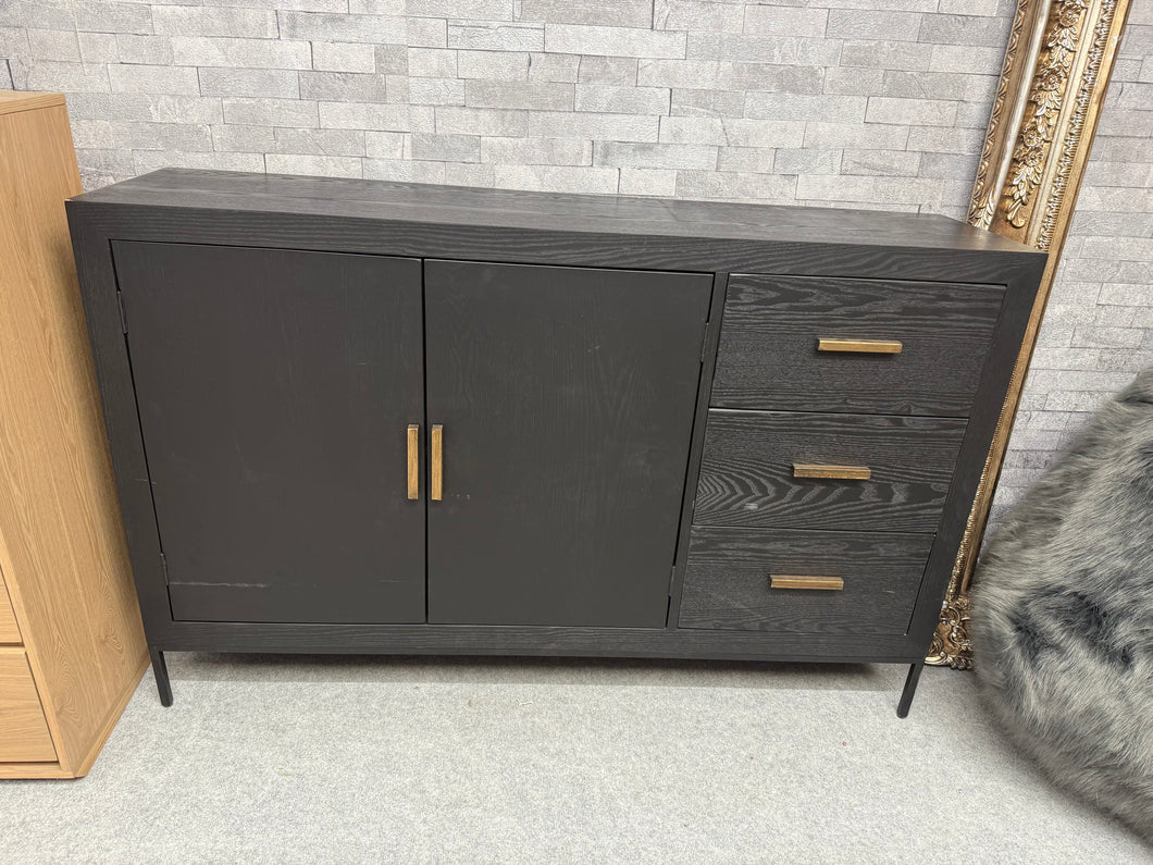 Transform your dining room with this Art Deco sideboard. This pre-owned piece delivers both style and substance. Three spacious drawers combined with a double cupboard and shelf provide the storage solution you've been seeking. Despite its minor surface marks, it remains in good working condition—a good investment for those who appreciate classic design.

Delivery Available

Overall Dimensions

140cm wide x 35.5cm deep x 89.5cm high        

