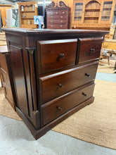 Load image into Gallery viewer, This mahogany chest of drawers combines reliable construction with practical storage solutions. Featuring two compact drawers above two full-length drawers, it provides flexible organisation for any room. The piece shows honest wear consistent with age, with only superficial marks that don't impact functionality or durability. A dependable furniture choice with genuine character.

Delivery Available

Overall Dimensions

99cm wide x 50cm deep x 97cm high

