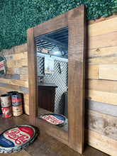Load image into Gallery viewer, Crafted from solid wood, this rustic mirror brings authentic character to any room. Its rustic finish and natural patina reflect years of charm, making it an ideal centrepiece for country, farmhouse, or vintage-inspired interiors. Structurally sound and ready to display.

Delivery Available

Overall Dimensions

60cm wide x 90.5cm high

