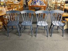 Load image into Gallery viewer, This set of 4 farmhouse chairs are both structurally sound and in overall good condition. Unfortunately one of the spindles on one chair needs repairing but nothing major. They could do with a fresh coat of paint to make them new again.

Overall Dimensions

approx : 37cm wide x 39cm deep x 82cm high 

DELIVERY AVAILABLE    

HAVE THIS PAINTED A COLOUR OF YOUR CHOICE FOR AN EXTRA £100 OR COMPLETELY STRIPPED BACK FOR £120 

For our other items see our website https://fossewayfurniture.co.uk

collection from c
