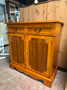 This sweet yew wood sideboard is structurally sound and in good condition minus a few small marks etc. It has 2 short dovetail jointed drawers over a double cupboard with 1 long shelf in.

Overall Dimensions

88cm wide x 41cm deep x 86cm high 

DELIVERY AVAILABLE    

HAVE THIS PAINTED A COLOUR OF YOUR CHOICE FOR AN EXTRA £70 

For our other items see our website https://fossewayfurniture.co.uk

collection from cv36 or bs36
