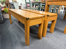 Load image into Gallery viewer, This lovely duo of oak dining benches are both structurally sound and in overall good condition. They are used and do have some marks but nothing too major at all. The legs can be taken off if need be for easier moving.

Overall Dimensions

each bench measures : 115cm wide x 31cm deep x 46cm high

DELIVERY AVAILABLE    

For our other items see our website https://fossewayfurniture.co.uk

collection from cv36 or bs36

