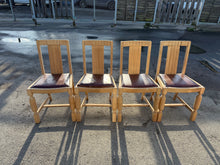 Load image into Gallery viewer, This stunning set of 4 oak chairs have been completely stripped back to their natural state so they may need a coat of wax for protection. The seat pads are all in tact with 1 or 2 needing some minor attention underneath. 1 does not fit the chair properly but this can be rectified.

Overall Dimensions

approx : 45cm wide x 40cm deep x 85cm high

DELIVERY AVAILABLE    

For our other items see our website https://fossewayfurniture.co.uk

collection from cv36 or delivery available 

