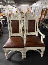 Load image into Gallery viewer, This glorious set of 6 x ornate style chairs are all structurally sound and in overall good condition. They are used and do have some marks but nothing major at all. This set has real leather seat pads and back rests. It consists of 4 uprights and 2 carvers

Overall Dimensions

Carver : 55cm wide x 50cm deep x 116cm high

DELIVERY AVAILABLE    

For our other items see our website https://fossewayfurniture.co.uk

collection from cv36 or bs36

