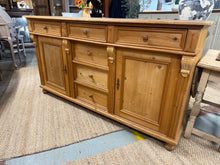 Load image into Gallery viewer, This gorgeous vintage pine sideboard is structurally sound and in overall good condition. It has ample storage with 6 dovetail jointed drawers and 2 cupboards with 1 shelf inside. It also comes complete with 1 key. It is used and does have some marks but nothing too major at all.

Overall Dimensions

167cm wide x 50.5cm deep x 91cm high

DELIVERY AVAILABLE    

For our other items see our website https://fossewayfurniture.co.uk

collection from cv36 or bs36

