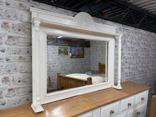 Load image into Gallery viewer, This gorgeous large white bevelled edged mantle mirror is structurally sound and in overall good condition. It does have some marks and some patina but this just not effect its use. Would be perfect hung above a mantle piece.

Overall Dimensions

140cm wide x 115cm high (18cm deep)

DELIVERY AVAILABLE    

For our other items see our website https://fossewayfurniture.co.uk

collection from cv36 or bs36

