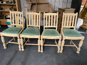 Transform your space with these 4 stunning oak chairs, stripped down to their beautiful, natural wood. Let the vibrant emerald green seat pads add a pop of color, or easily recover them to match your personal style.  Please note this item is bare wood so hasn't had any wax etc for protection. We recommend 'Clear Wax' by Frenchic.  Overall Dimensions  approx : 46cm wide x 42cm deep x 90.5cm high         DELIVERY AVAILABLE      For our other items see our website https://fossewayfurniture.co.uk