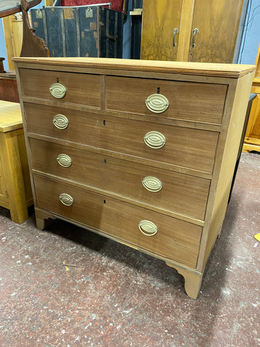 Experience the beauty and functionality of this sturdy Stripped Mahogany Chest Of Drawers. With ample storage space, including 2 short drawers and 3 long drawers, this piece is perfect for organizing your belongings. Although one leg may need slight adjustment, this chest is in excellent condition overall and will make a stunning addition to your home. 