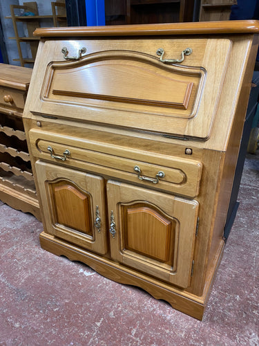 This durable, pine bureau is in excellent structural condition and offers plenty of storage with a drop-down writing desk above one long drawer, and a double cupboard.  Overall Dimensions  94cm wide x 45cm deep x 110cm high        DELIVERY AVAILABLE      For our other items see our website https://fossewayfurniture.co.uk 