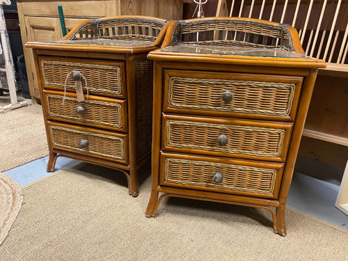 Experience the beauty and functionality of our Wicker Bedsides with this stunning pair. The wooden construction and wicker fronted drawers not only create a structurally sound piece, but also add a touch of charm to any room. Keep your belongings safe and organized with the 3 handy drawers in each unit, and protect the surface with the removable glass top.  