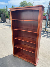 Load image into Gallery viewer, This high-quality pine bookcase is durable and in great shape. It includes 4 adjustable shelves, though some minor wear is evident from prior use.  Overall Dimensions  87cm wide x 28cm deep x 153cm high

