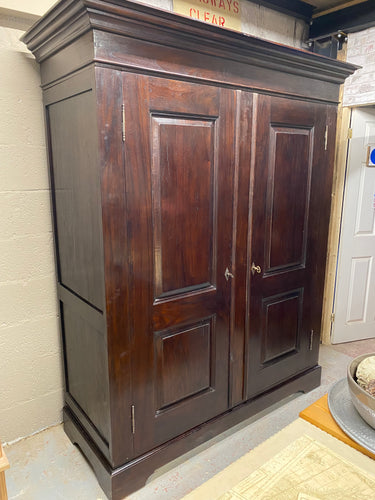 This stunning Lombok wardrobe is made from hard wood / teak and is in good condition and structurally sound. It does have a few minor marks but nothing too major. It has one hanging rail and 1 lower shelf for storage and comes complete with two original keys. This item dismantles completely down for easier moving  Overall Dimensions  175cm wide x 71cm deep x 211cm high   DELIVERY AVAILABLE      For our other items see our website https://fossewayfurniture.co.uk  collection from cv36 or bs36