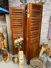 Load image into Gallery viewer, This stunning teak room divider is structurally sound and in great condition. It has 3 panels which can be easily folded. This item is used and may have the odd mark but nothing too major. This piece is sure to add charm and character to any room.  
