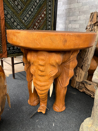 Experience the exotic charm of Bali in your own home with this stunning elephant table. Its sturdy construction and impeccable condition make it a perfect addition to any room. Get ready to start conversations and bring a touch of adventure into your decor!  Overall Dimensions  approx : 66cm diameter x 60cm high   DELIVERY AVAILABLE      For our other items see our website https://fossewayfurniture.co.uk  collection from cv36 or bs36