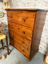 Load image into Gallery viewer, This charming pine chest of drawers combines practical storage with timeless appeal. Featuring four spacious long drawers, it offers ample room for bedroom essentials, linens, or everyday items. Built to last, this piece shows gentle signs of age and use that add character rather than detract from its functionality. Structurally sound and in good working order.

Delivery Available

Overall Dimensions

84cm wide x 45.5cm deep x 108cm high&nbsp;&nbsp;

