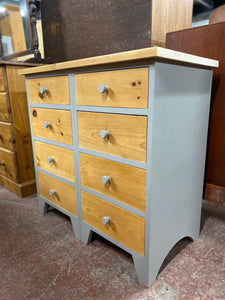 Enhance your storage space with this charming country-style chest of drawers, painted in the luxurious 'Charleston Grey' by Farrow &amp; Ball. The top and drawer fronts have been expertly sanded and waxed, giving this piece a beautiful finish. With 8 short dovetail jointed drawers, you'll have plenty of room for all your belongings.  Overall Dimensions  85cm wide x 44cm deep x 82cm high   