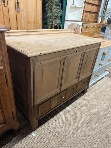 Expertly crafted to showcase the beauty of natural oak, this coffer offers a vintage aesthetic with modern functionality. Crafted with 2 drawers and spacious storage inside, it's the perfect addition to any living space. Though it may show some signs of wear with slight marks and a missing handle, that is a testament to its age and character, making it a unique and timeless piece for your home. Ensuring longevity, a coat of wax is easily applied for added protection.

Overall Dimensions

106cm wide x 52cm d