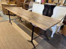 Load image into Gallery viewer, Enjoy the functionality and durability of this 8ft trestle table, which comfortably seats 12 people and can be used for both indoor and outdoor entertaining. Despite being used, its structural integrity remains intact, making it a reliable choice for any occasion. The top can also be easily detached from the base for effortless transport.

Overall Dimensions

244cm long x 73cm wide x 75cm high

DELIVERY AVAILABLE      

For our other items see our website https://fossewayfurniture.co.uk

collection from our
