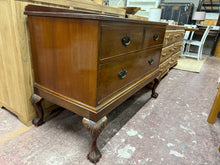 Load image into Gallery viewer, This cheerful Edwardian mahogany hall table remains in good overall condition with solid structural integrity. While there are a few marks (particularly along one edge), they&#39;re quite minor. The piece features two compact drawers with quality dovetail joints positioned above a single long drawer, providing excellent storage options.

Overall Dimensions

109.5cm wide x 56cm deep x 84cm high

DELIVERY AVAILABLE      

HAVE THIS PAINTED A COLOUR OF YOUR CHOICE FOR AN EXTRA £70 OR HAVE IT COMPLETELY STRIPPED BA
