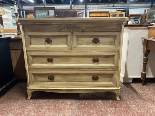 This wonderfully antique-looking chest of drawers makes a strong, steady statement, with great condition and just a few marks adding to its classic charm. With two short drawers and two long ones, this piece holds a wealth of storage possibilities!  Overall Dimensions  121cm wide x 50.5cm deep x 97.5cm high 
