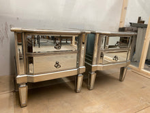 Load image into Gallery viewer, This outstanding pair of glass bedsides boasts exceptional strength and quality. There may be a few minor blemishes, but nothing significant. Both units contain two convenient, small drawers for storage.  Overall Dimensions  55cm wide x 52cm deep x 56cm high    DELIVERY AVAILABLE      For our other items see our website https://fossewayfurniture.co.uk   
